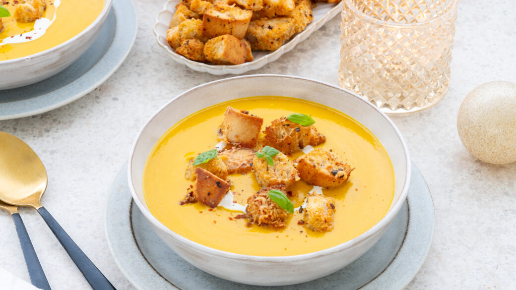 Pumpkin lentil soup with harissa croutons