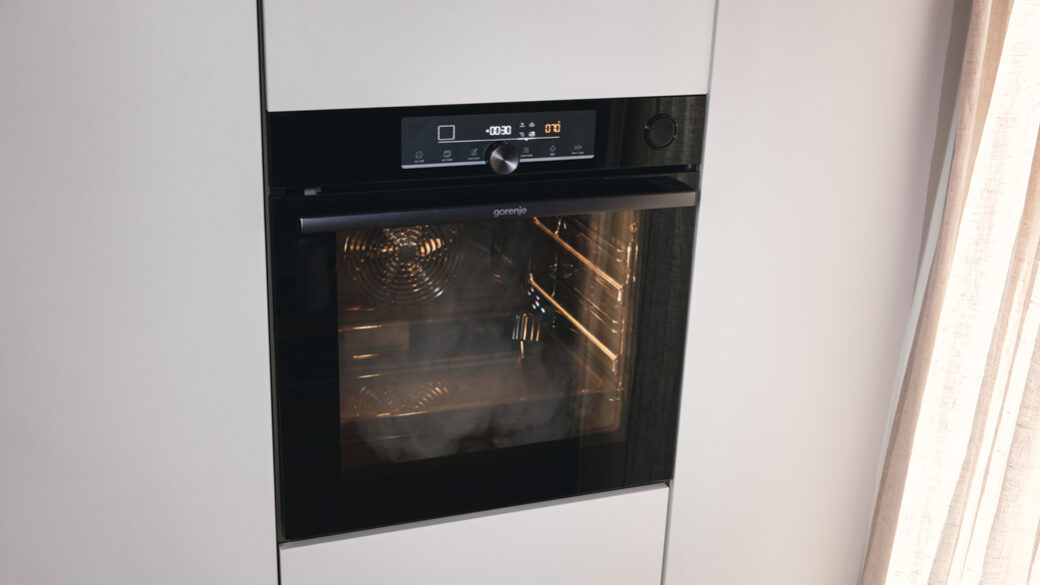 Gorenje oven surrounded by light furniture.